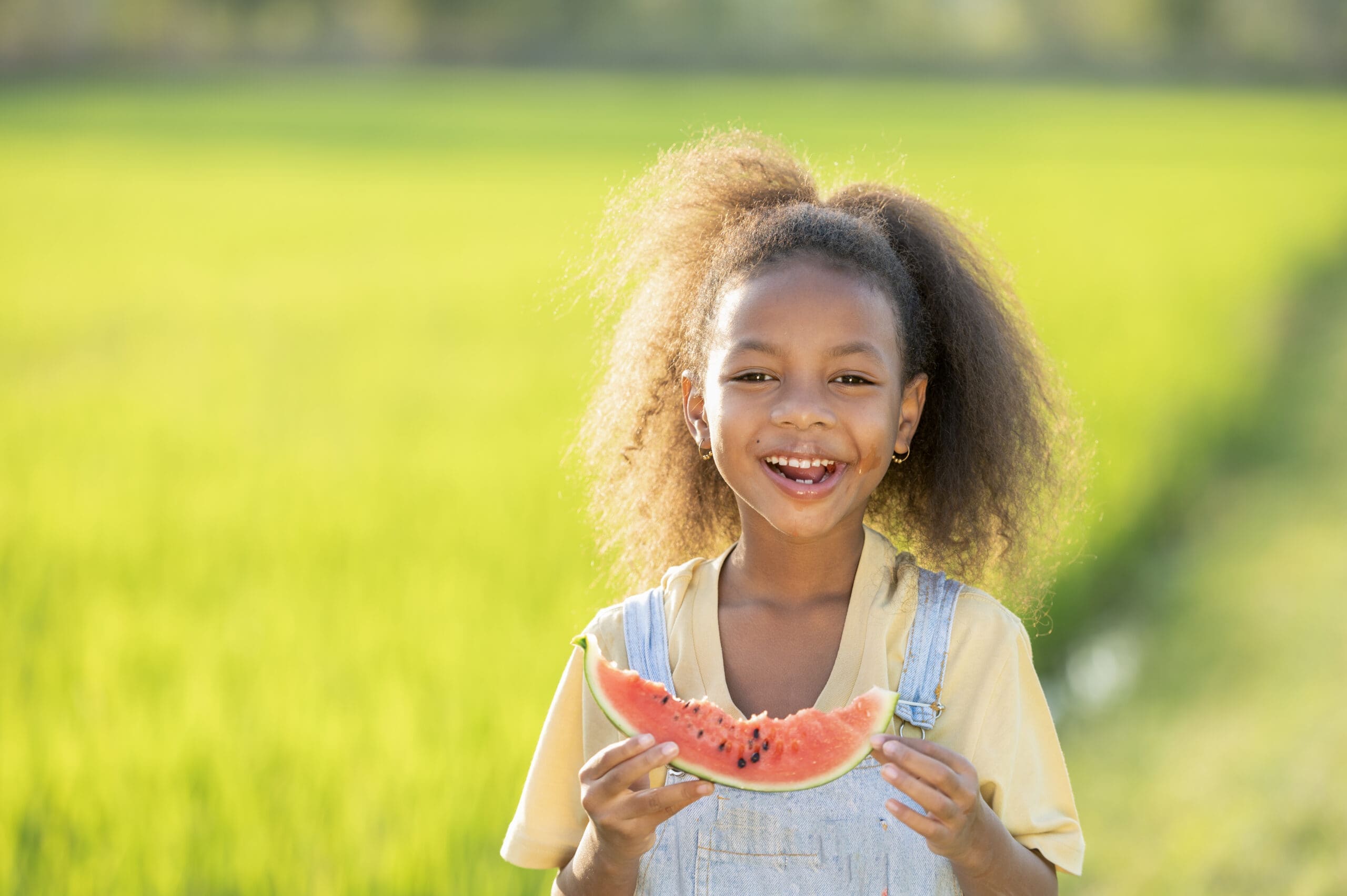 girl eating watermelon